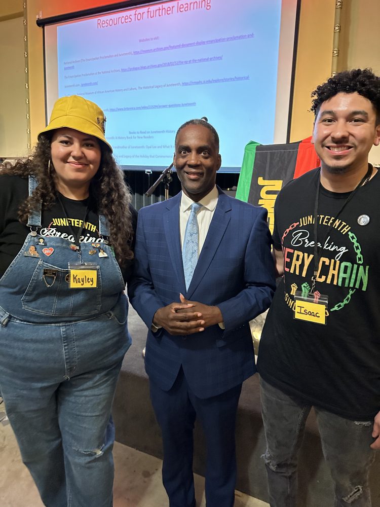 McColley and her brother, Isaac, with the Juneteenth keynote speaker Reggie Jackson, an internationally recognized author, speaker and expert on race relations.