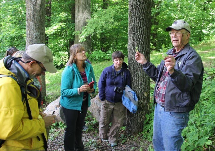 UW-Stevens Point Professor Emeritus Bob Freckmann leads an interpretive hike on behalf of the North Central Conservancy Trust (NCCT).