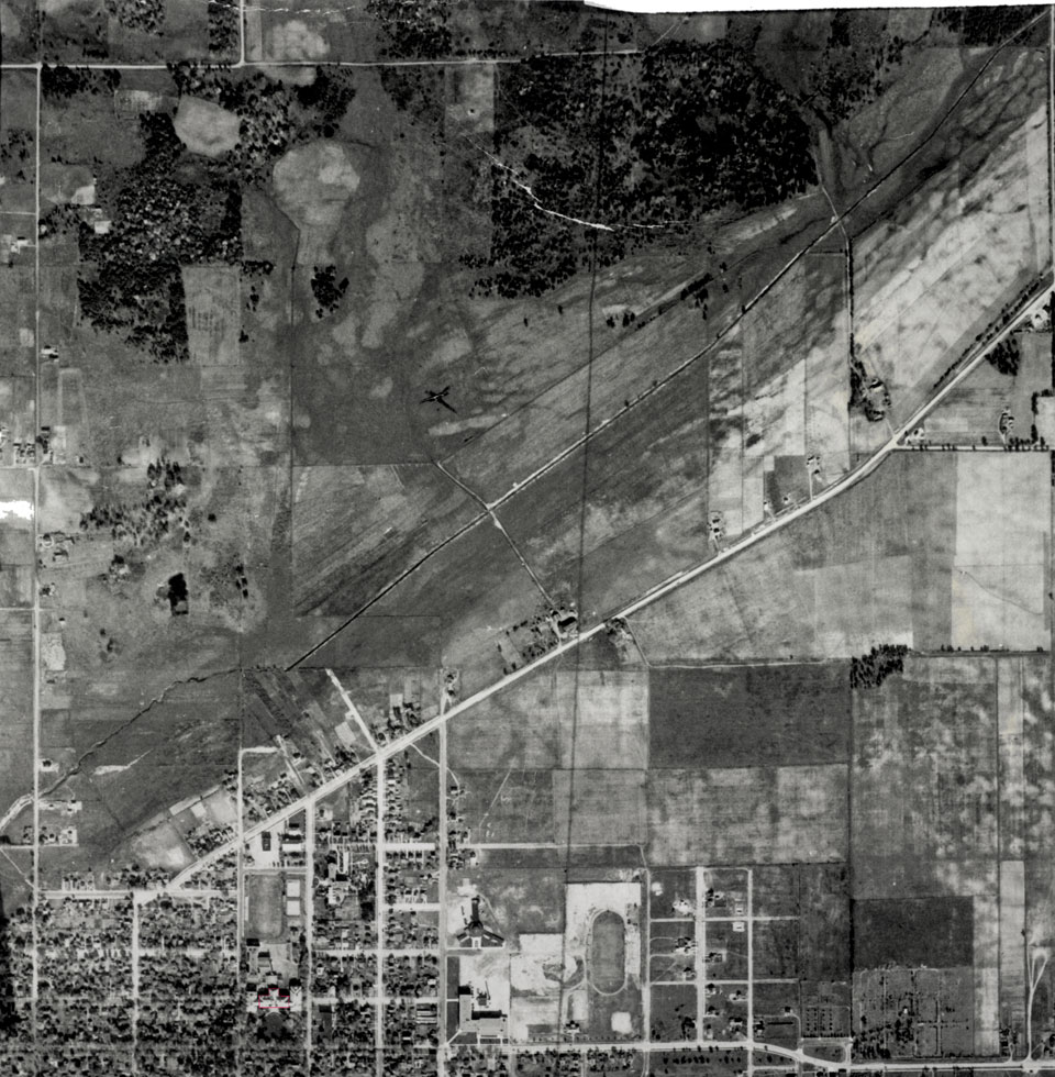 Aerial photo of historic moses creek and north campus area, 1938.