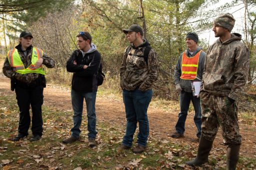 Associate Professor Mike Rader (second from right) uses strong relationships with the Wisconsin warden force and hands on experience to prepare students for careers in conservation law enforcement.